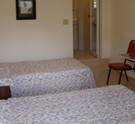 Micro Beach Hotel Garapan Habitación foto